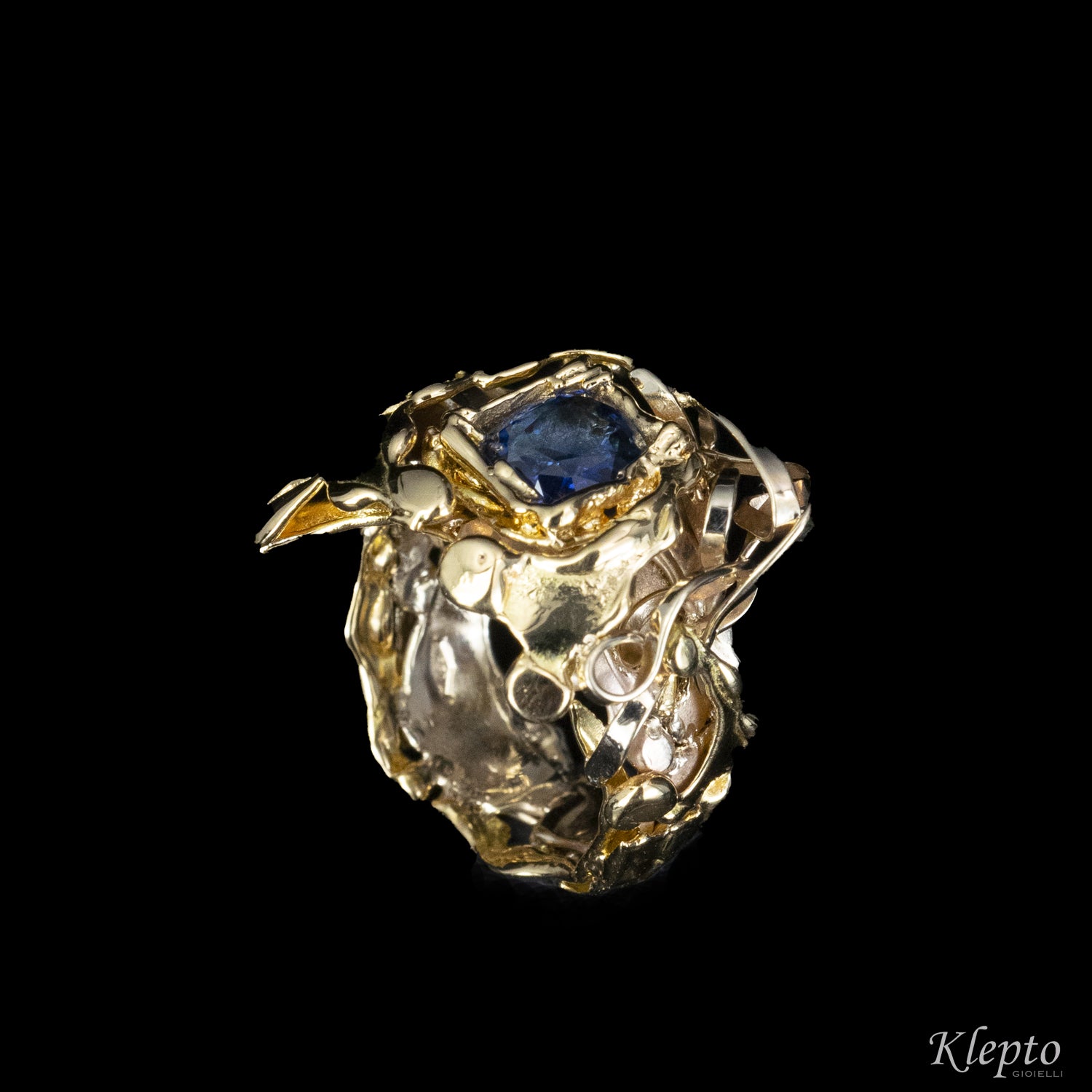 Anello in oro bianco naturale, oro giallo e Zaffiro blu